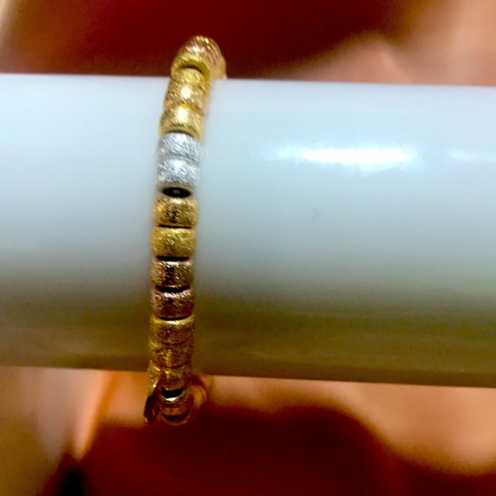 Stretch silver,gold,rose gold bracelet. Mayamar brand sold in exclus. boutiques